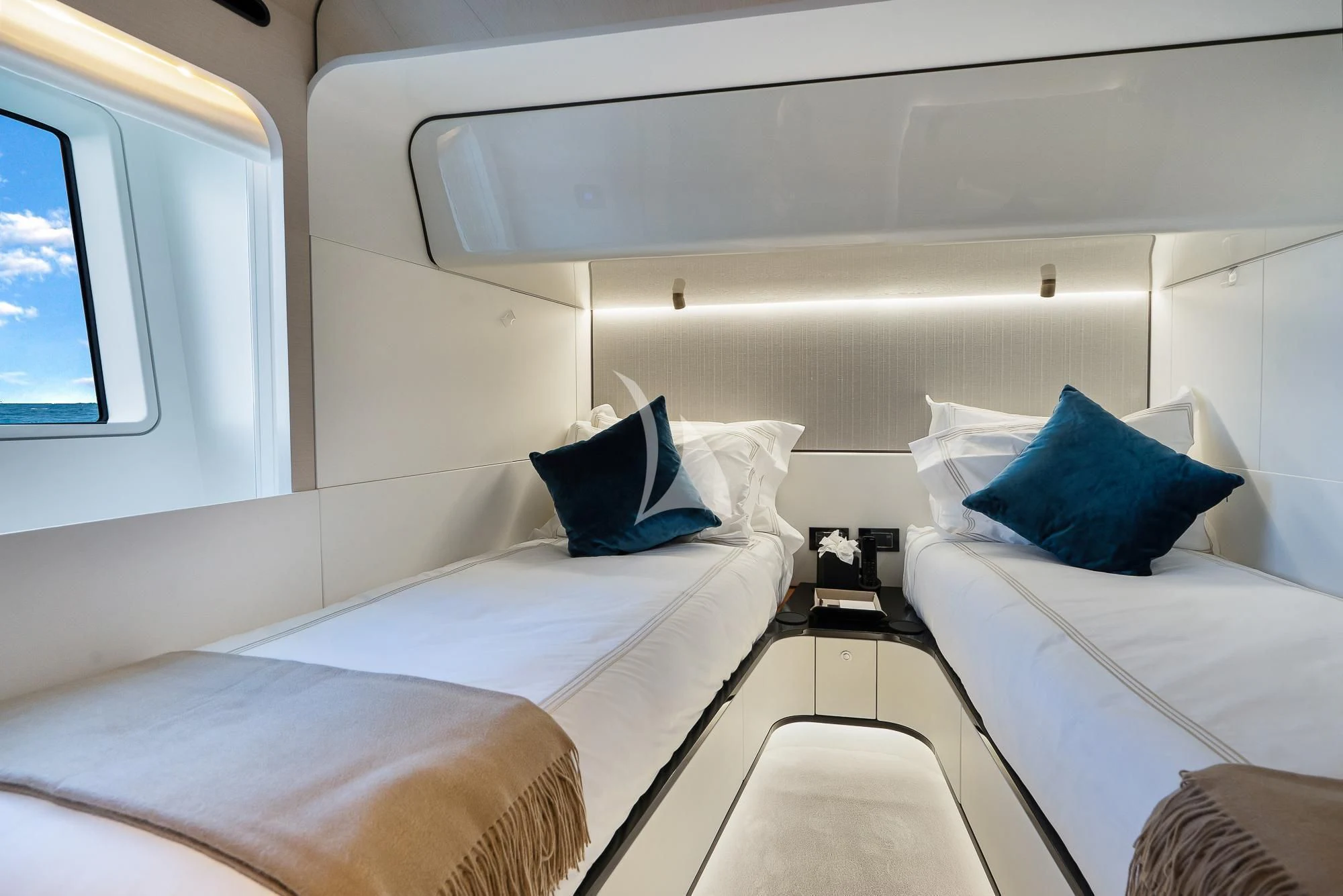 a couple of beds in a room aboard SEA OWL Yacht for Sale