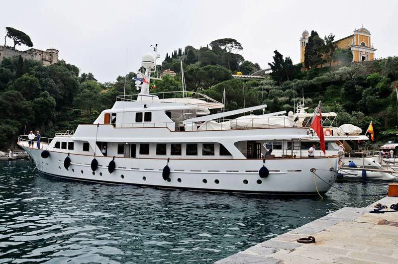 a large white boat in the water aboard MIZAR Yacht for Sale