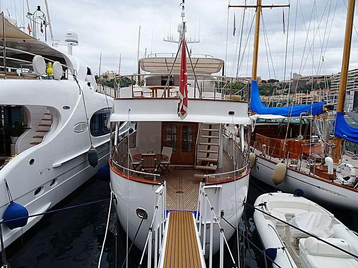 a group of boats are parked in a harbor aboard MIZAR Yacht for Sale