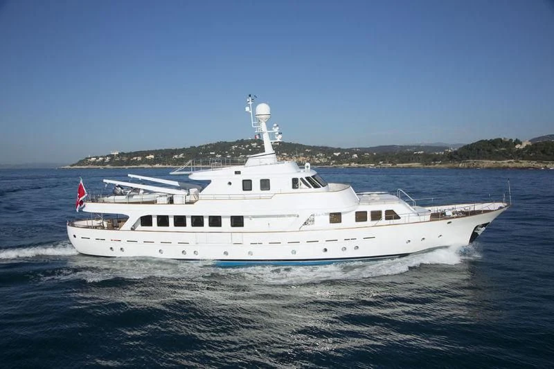 a white yacht in the water aboard MIZAR Yacht for Sale