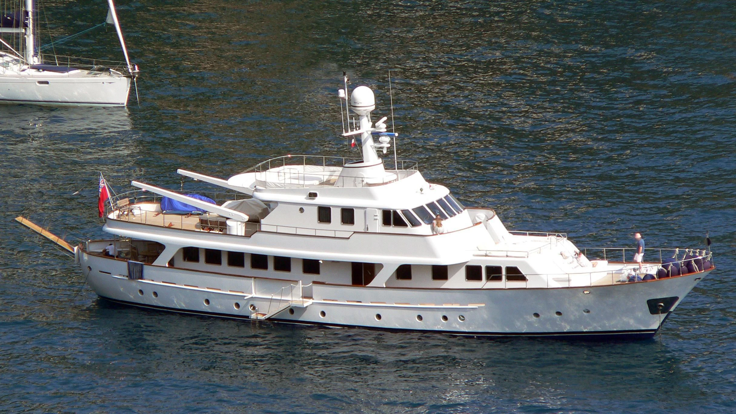 a white yacht in the water aboard MIZAR Yacht for Sale
