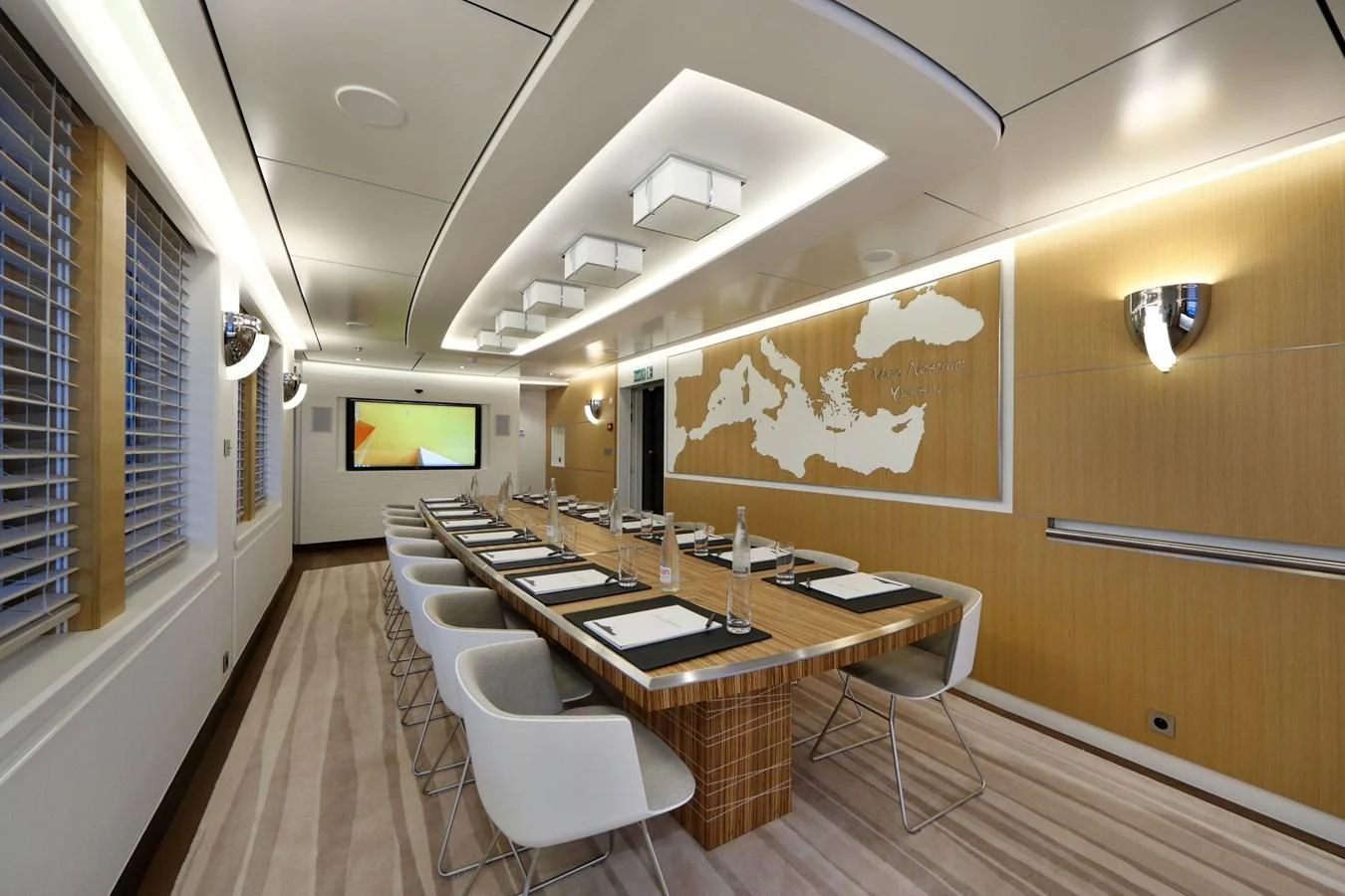 a room with a table and chairs aboard YERSIN Yacht for Charter