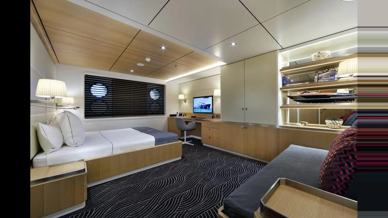 a room with a bed and a tv aboard YERSIN Yacht for Charter
