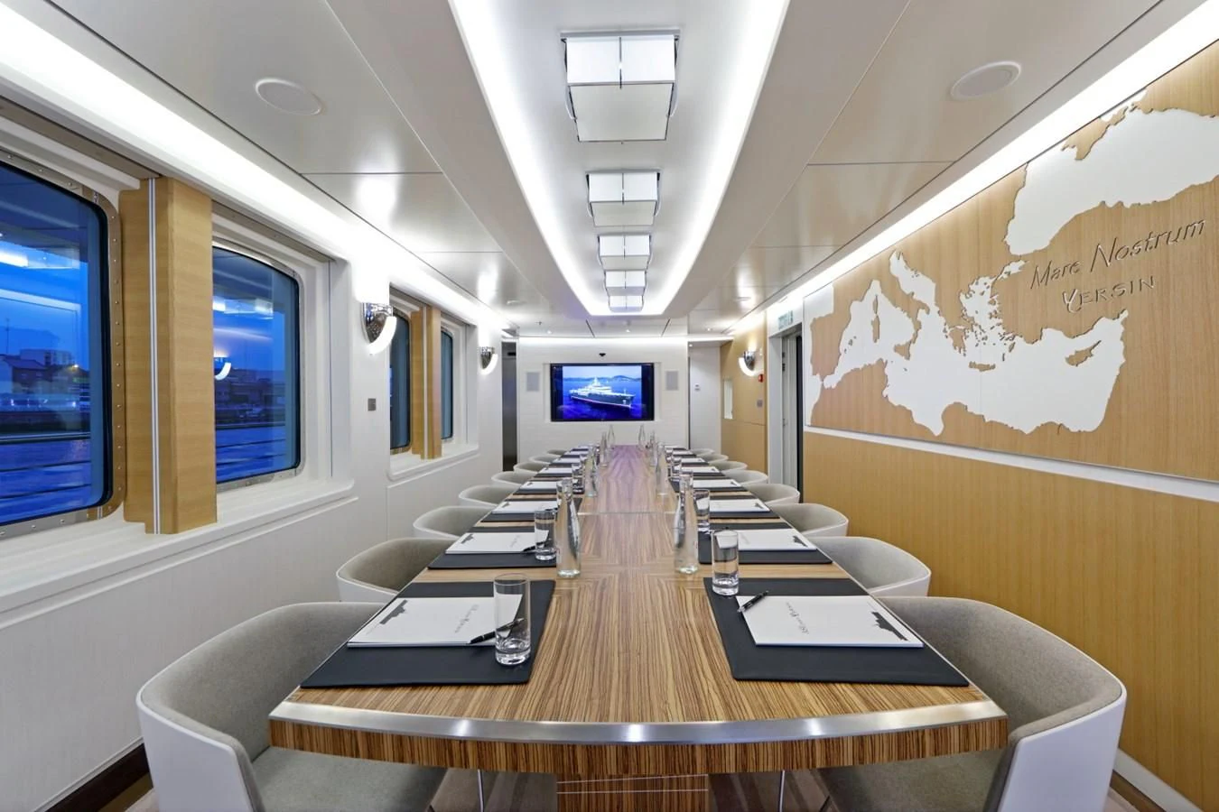 an empty conference room aboard YERSIN Yacht for Charter