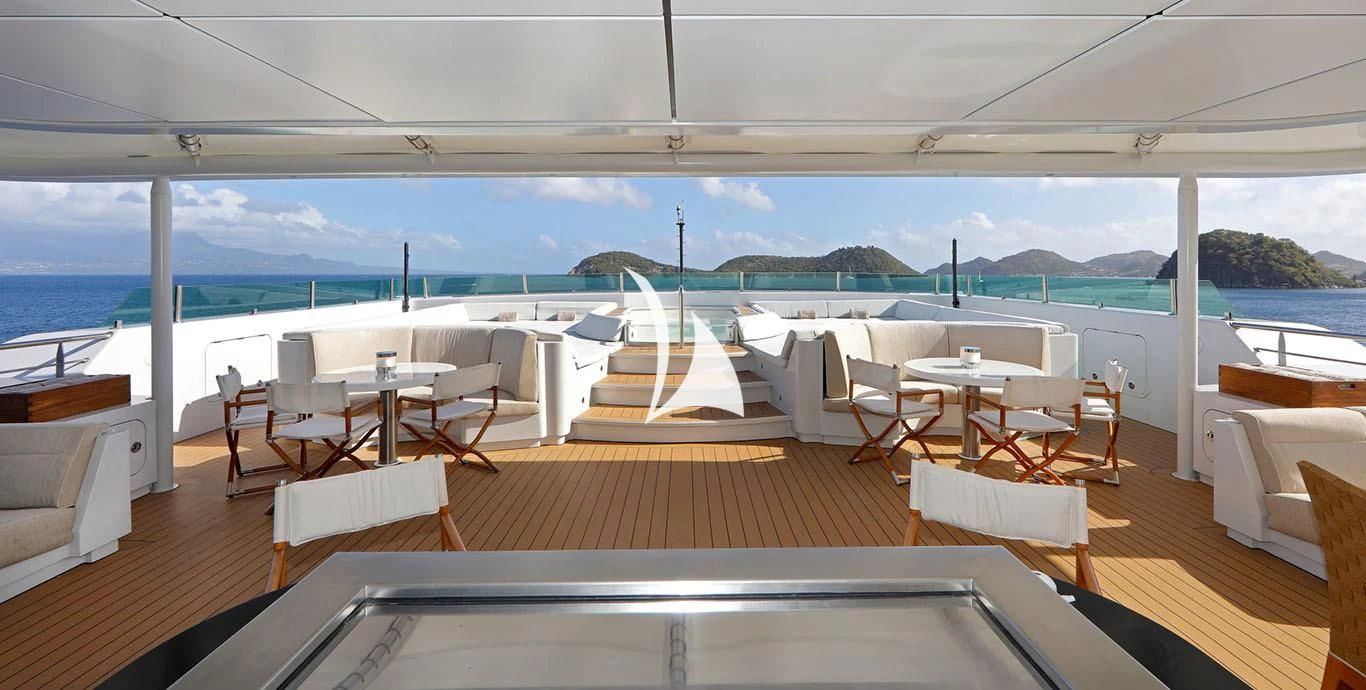 a room with a table and chairs aboard YERSIN Yacht for Charter