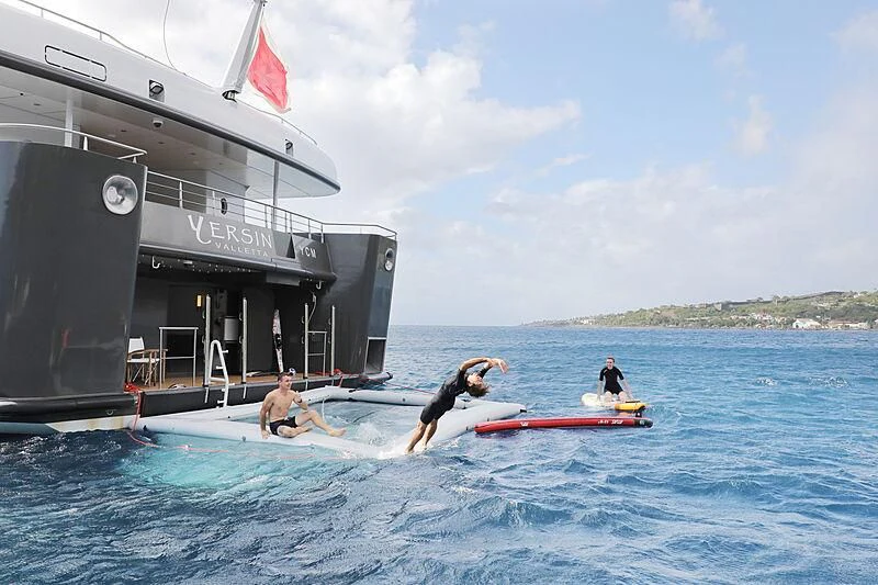 a group of people on a boat aboard YERSIN Yacht for Charter