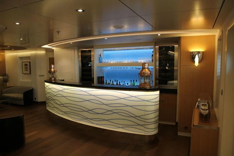 a large room with a large screen aboard YERSIN Yacht for Charter