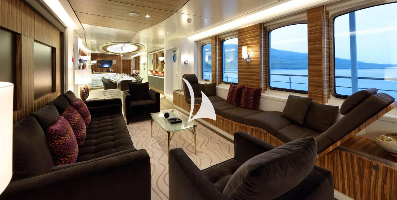 a living room with a large window aboard YERSIN Yacht for Charter