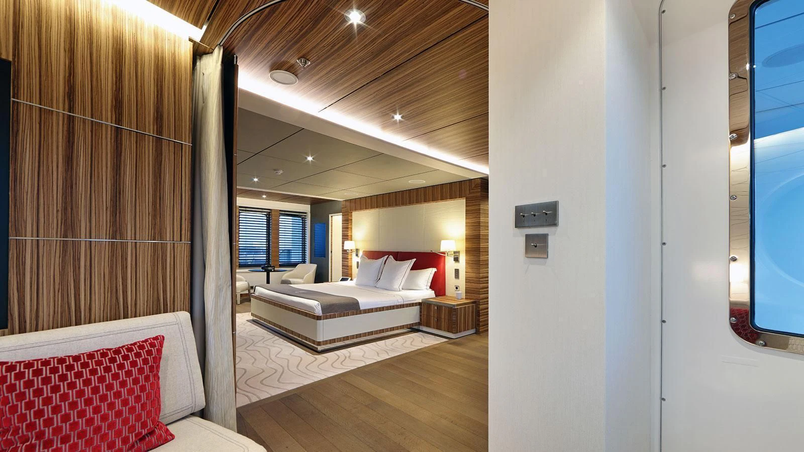 a room with a bed and a window aboard YERSIN Yacht for Charter