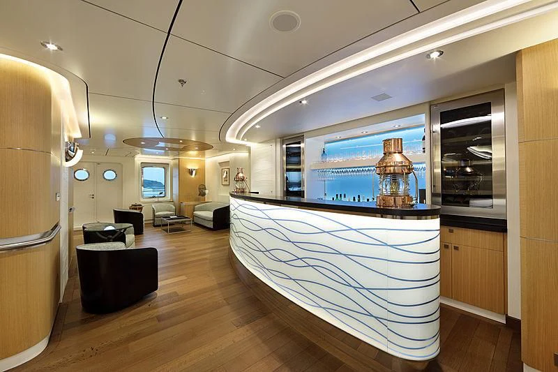 a room with a large mirror and a large window aboard YERSIN Yacht for Charter