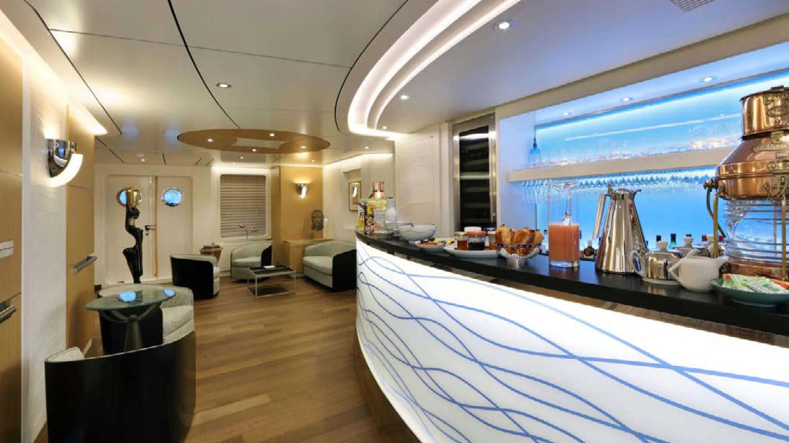 a large room with a pool table and chairs aboard YERSIN Yacht for Charter