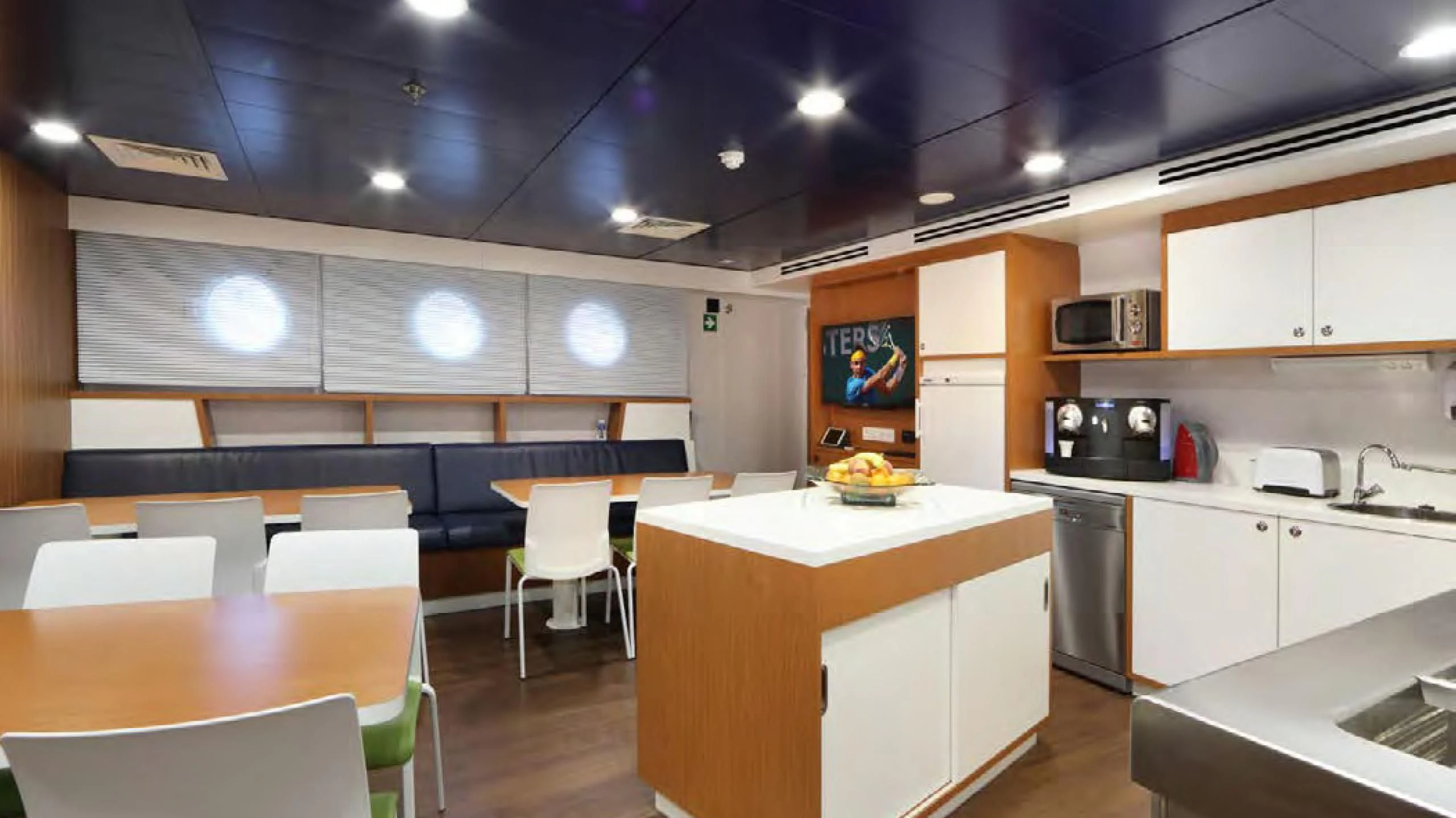 a kitchen with white cabinets aboard YERSIN Yacht for Charter