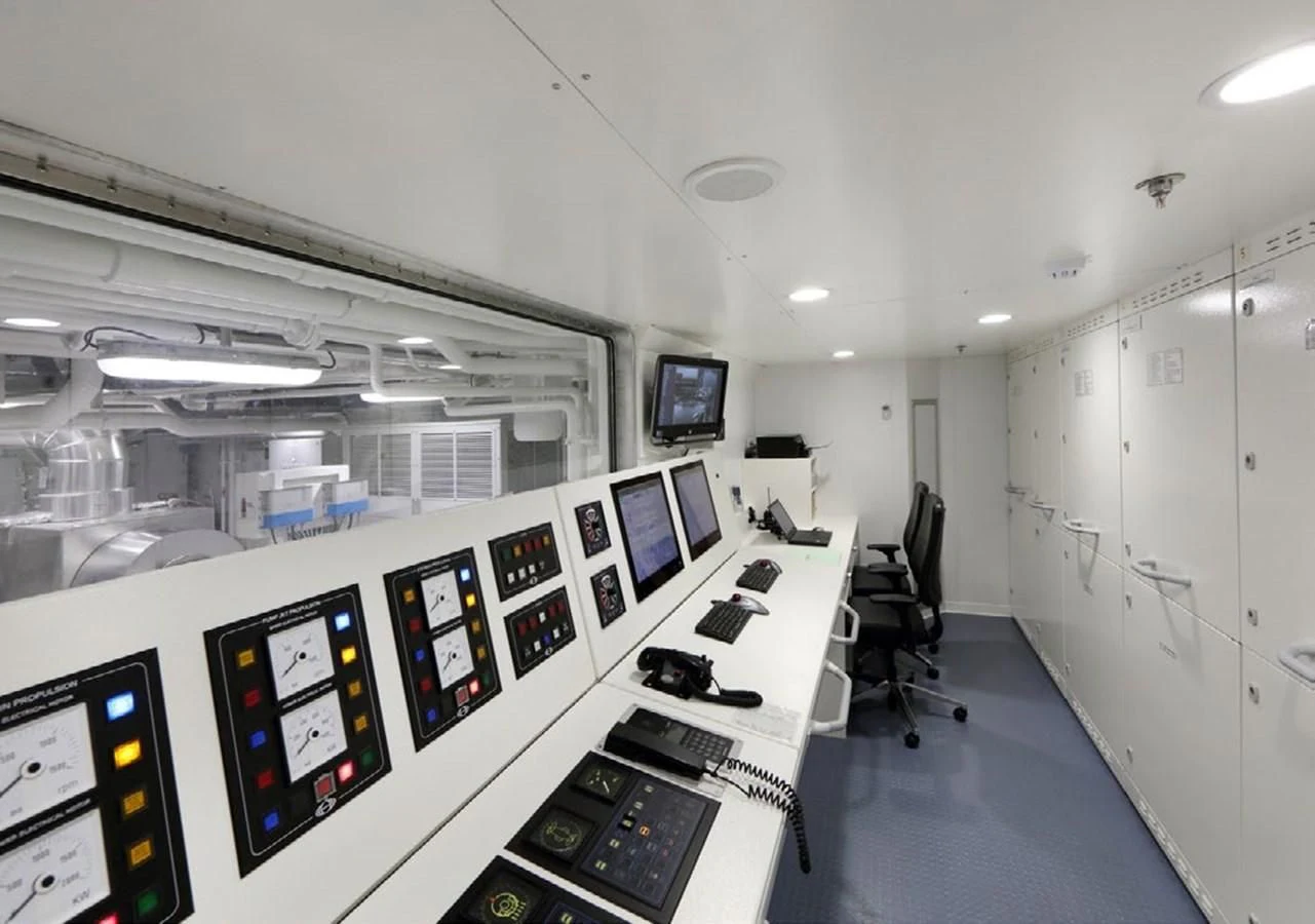 a room with computers and monitors aboard YERSIN Yacht for Charter