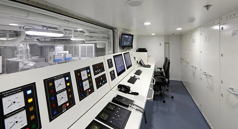 a room with computers and monitors aboard YERSIN Yacht for Charter