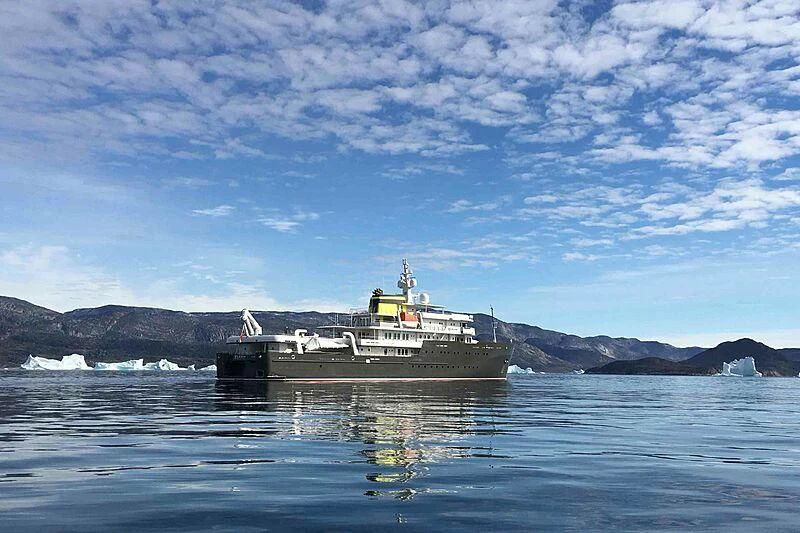 a large ship in the water aboard YERSIN Yacht for Charter