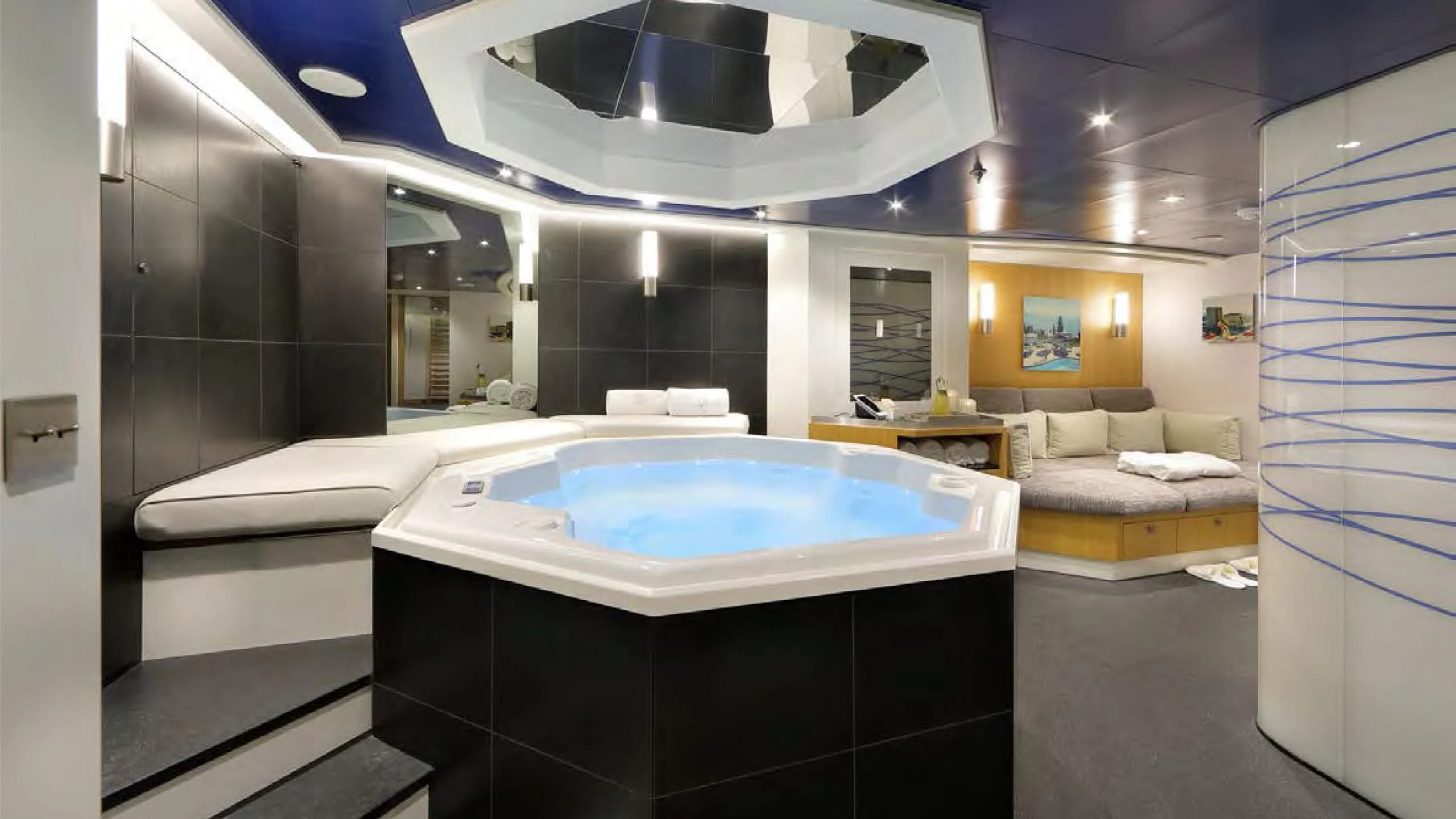 a modern bathroom with a large jacuzzi tub aboard YERSIN Yacht for Charter