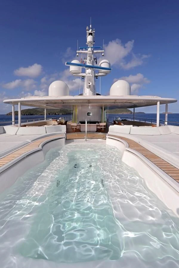 a large white building with a tower aboard YERSIN Yacht for Charter