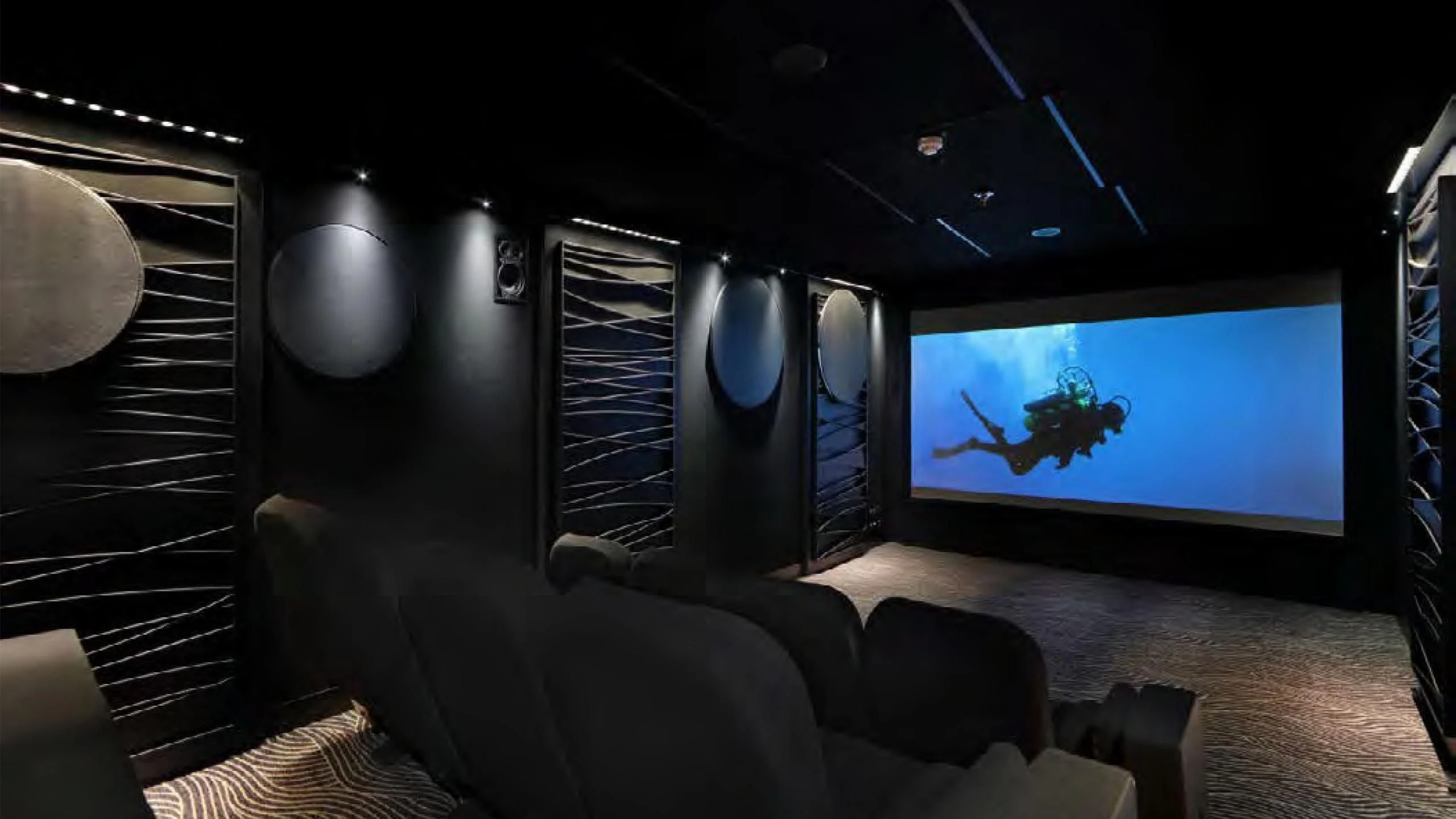 a room with a large screen aboard YERSIN Yacht for Charter
