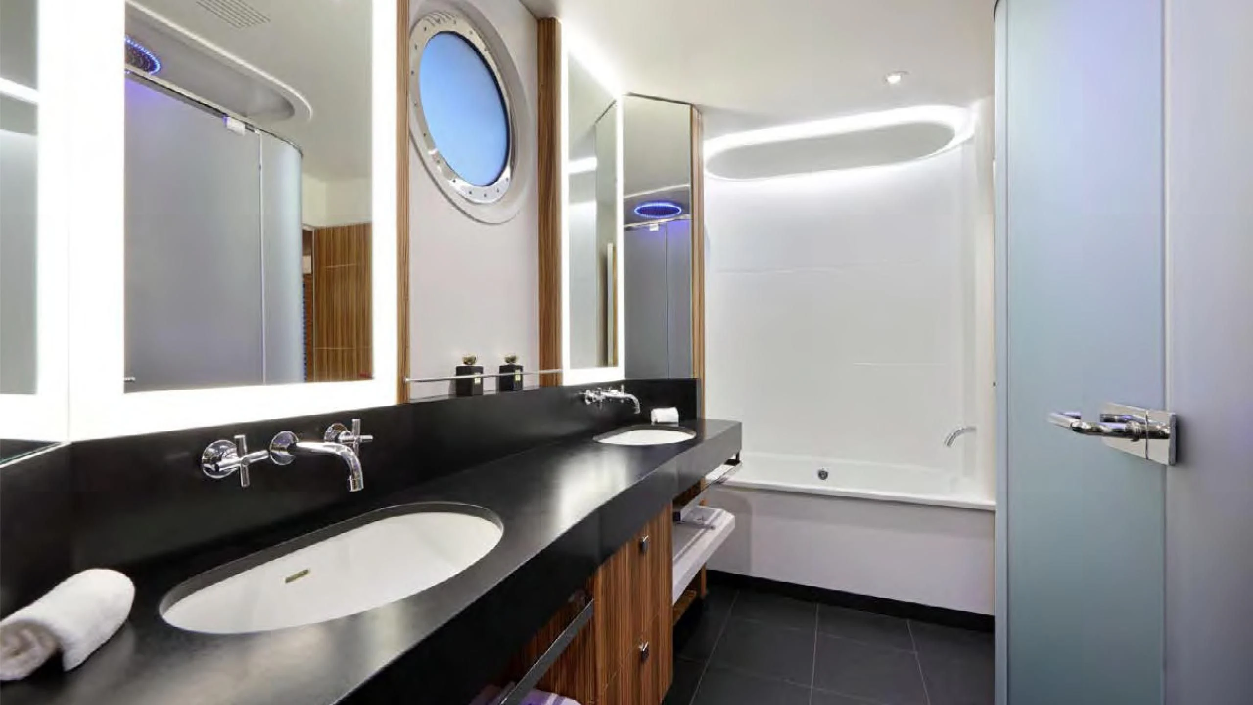 a bathroom with a large mirror aboard YERSIN Yacht for Charter