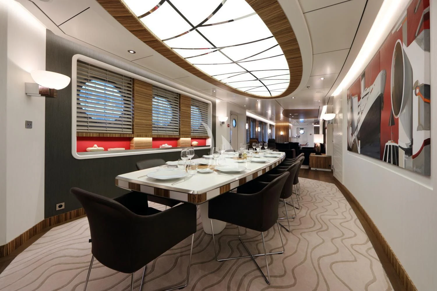 a room with a table and chairs aboard YERSIN Yacht for Charter