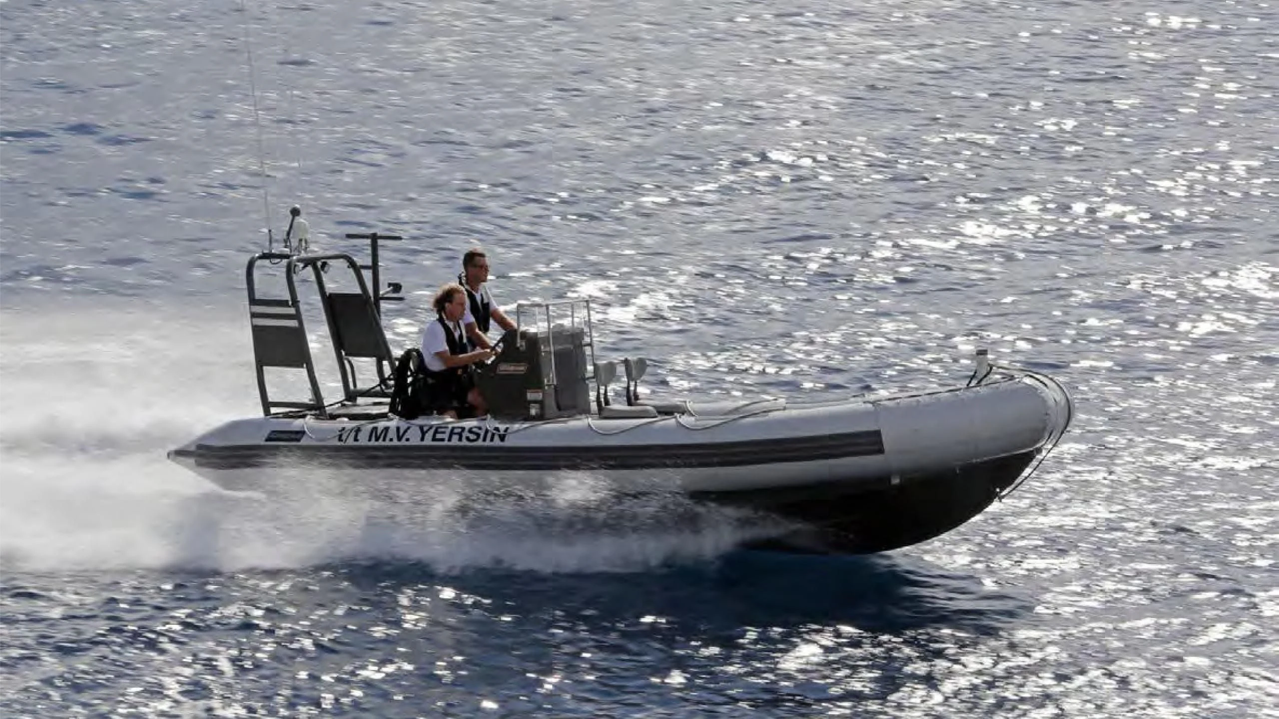 a couple of people on a boat aboard YERSIN Yacht for Charter