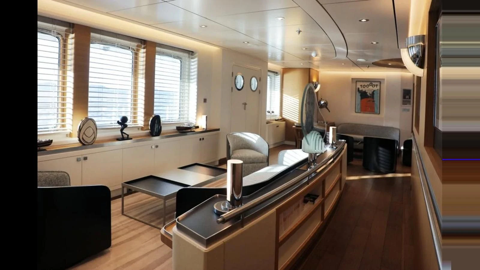a room with a couch and a desk aboard YERSIN Yacht for Charter