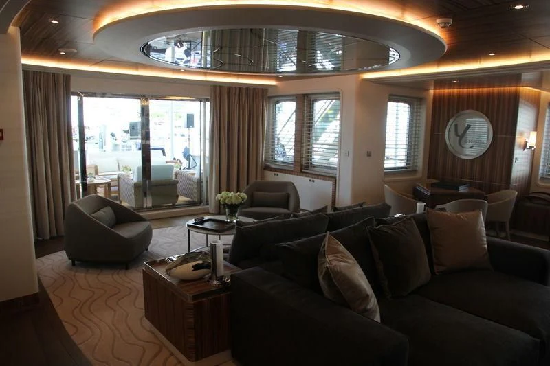 a living room with a large window aboard YERSIN Yacht for Charter