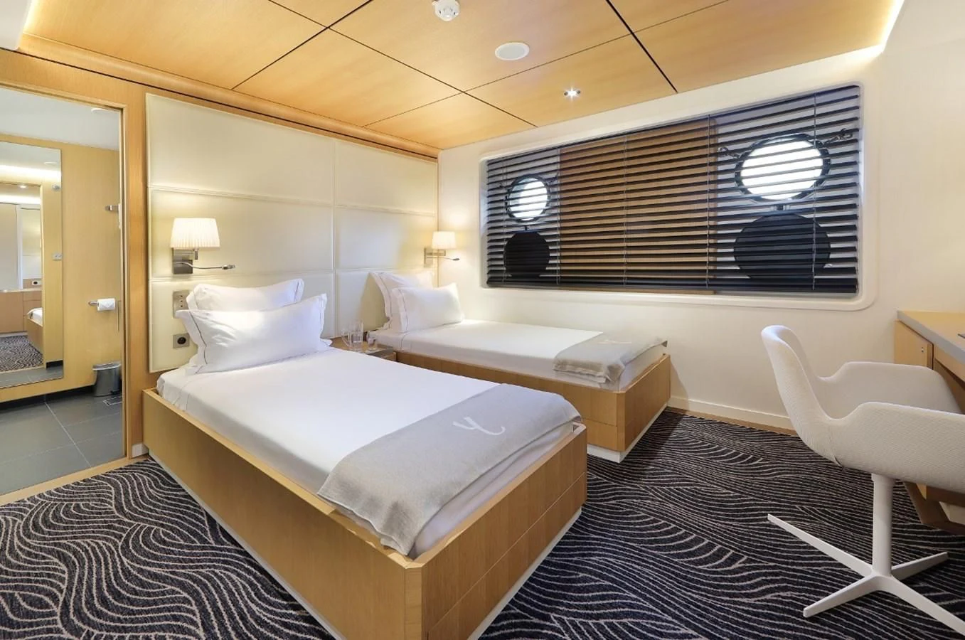 a room with two beds aboard YERSIN Yacht for Charter