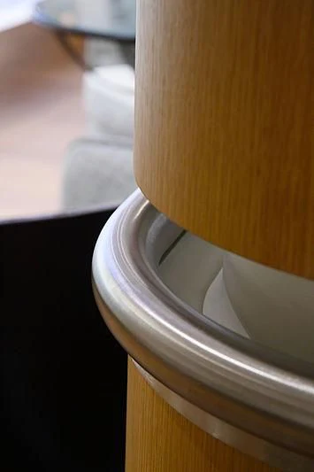 a white cup with a black handle aboard YERSIN Yacht for Charter