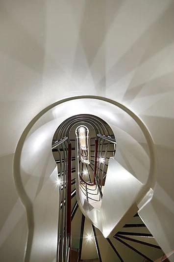 a white circular object with a round silver object on it aboard YERSIN Yacht for Charter