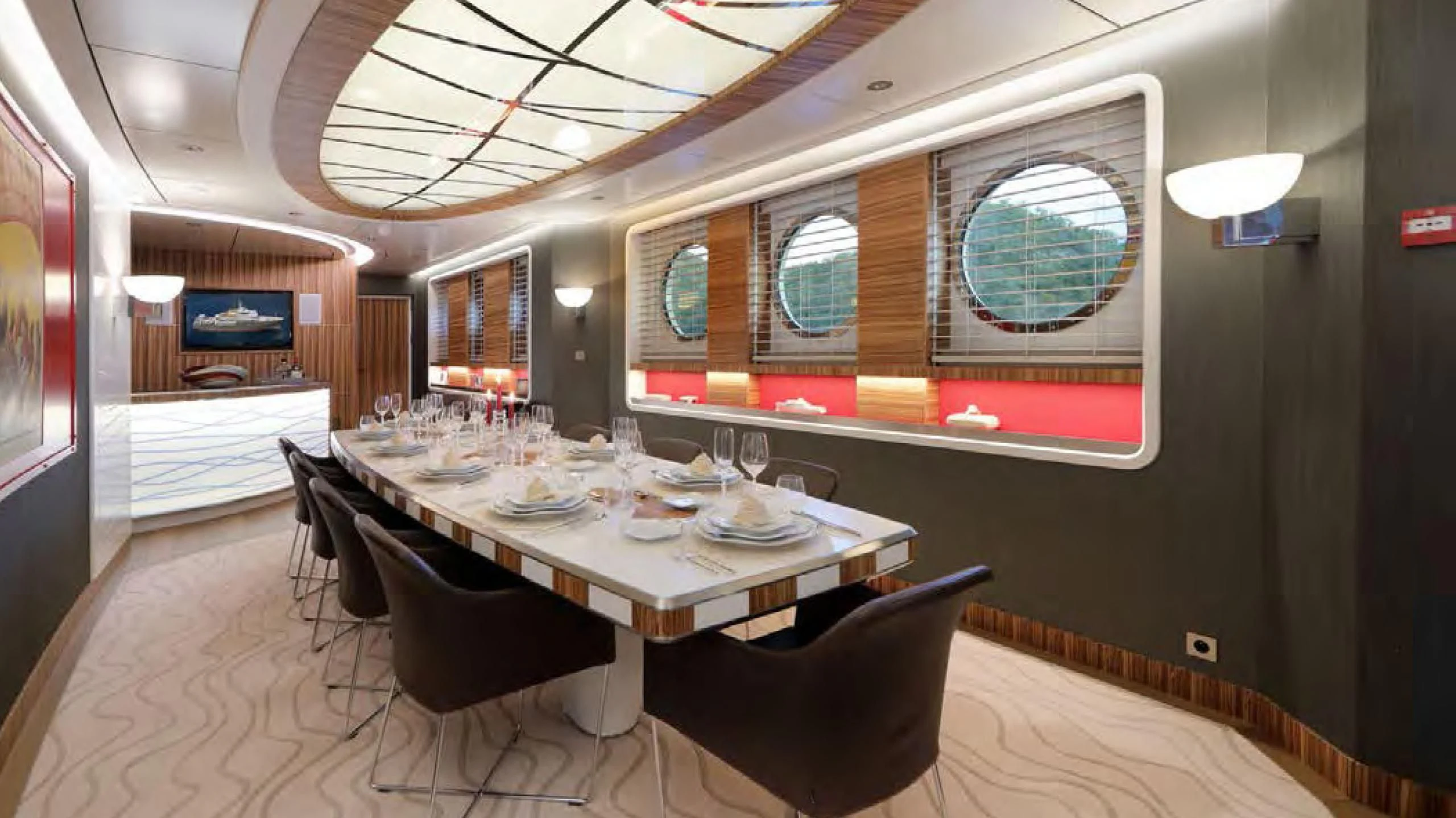 a dining room with a table and chairs aboard YERSIN Yacht for Charter
