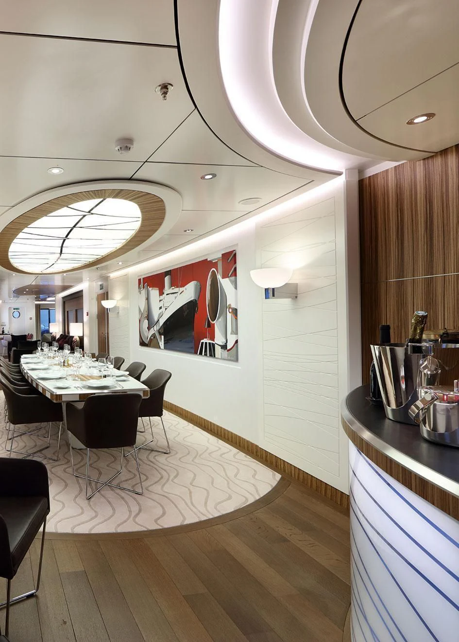 a kitchen with a table and chairs aboard YERSIN Yacht for Charter