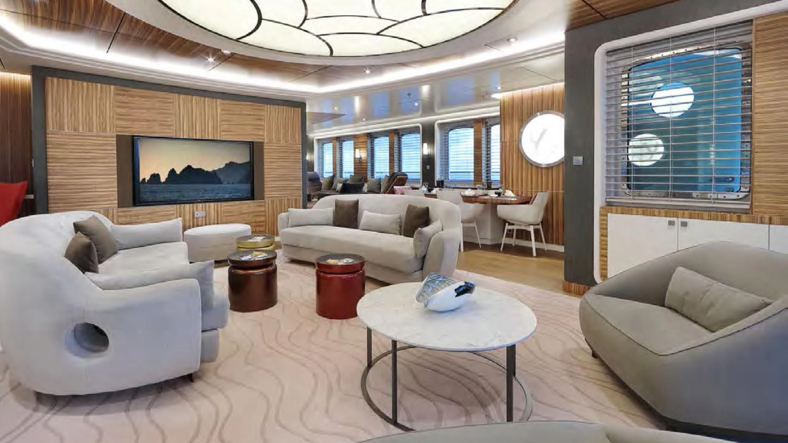 a living room with a large screen aboard YERSIN Yacht for Charter