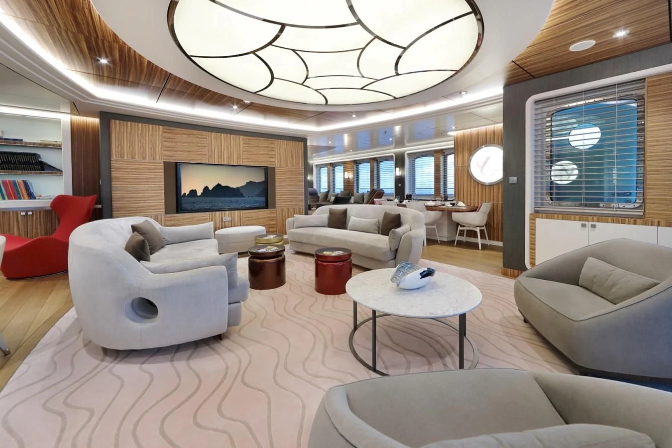 a living room with a large screen aboard YERSIN Yacht for Charter