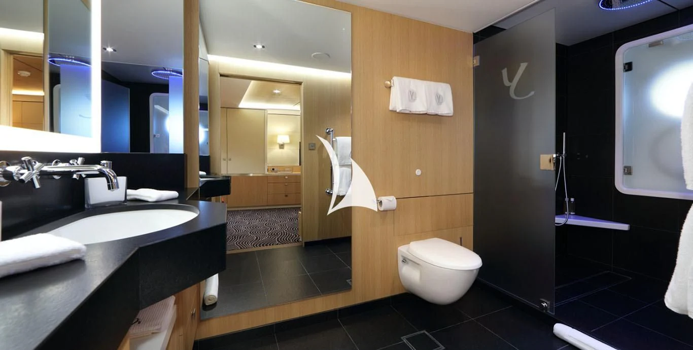 a bathroom with a urinal and a sink aboard YERSIN Yacht for Charter