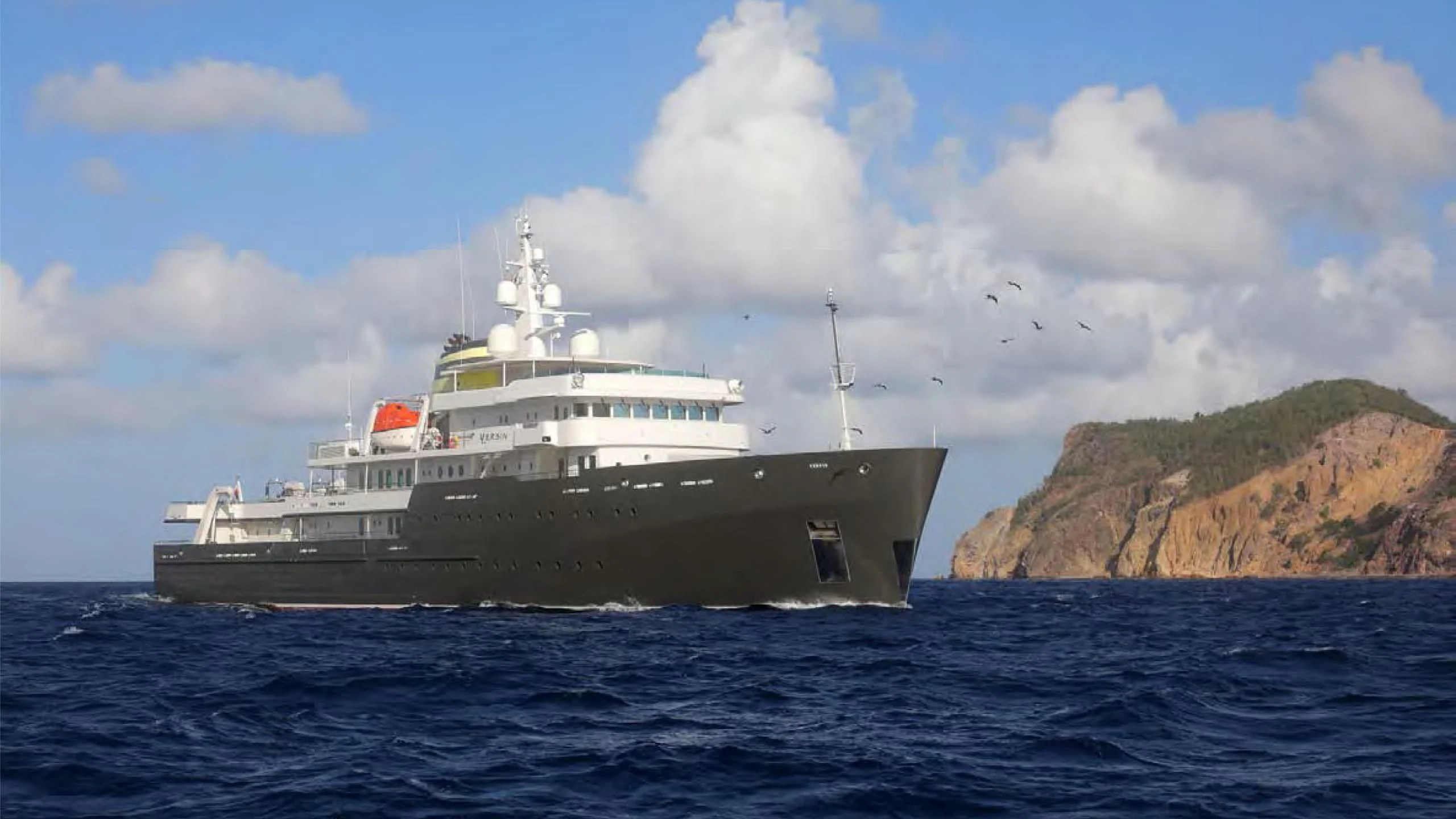 a large ship in the water aboard YERSIN Yacht for Charter