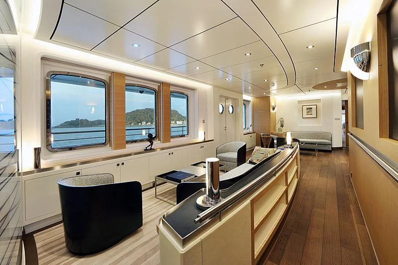 a room with a table and chairs aboard YERSIN Yacht for Charter