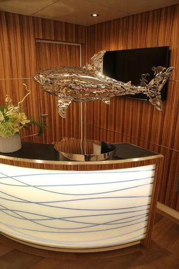 a turtle on a table aboard YERSIN Yacht for Charter