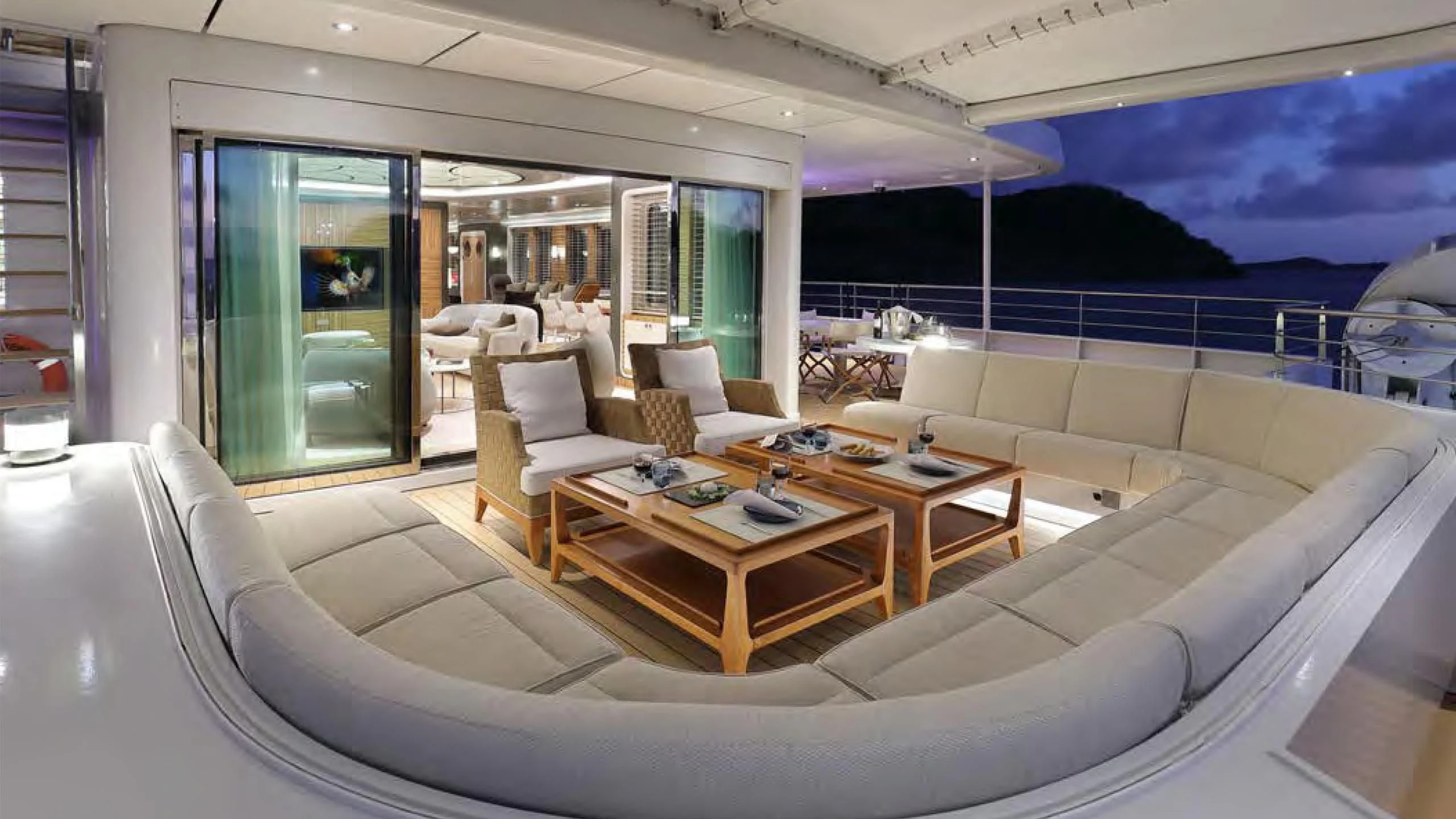 a living room with a couch and a table aboard YERSIN Yacht for Charter