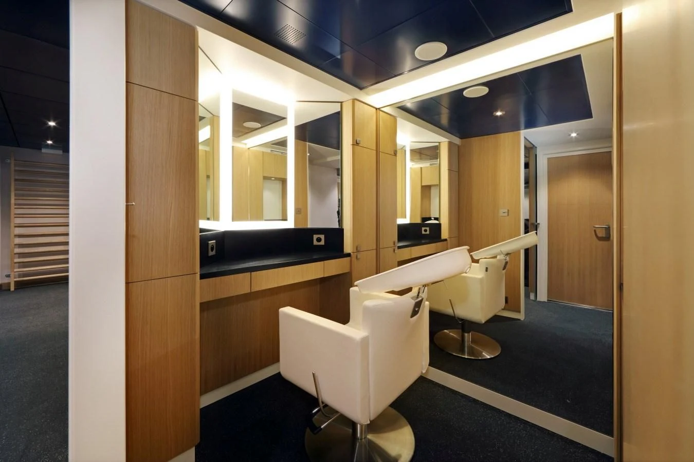 a room with a chair and a desk aboard YERSIN Yacht for Charter