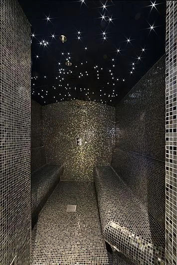 a dark tunnel with lights aboard YERSIN Yacht for Charter