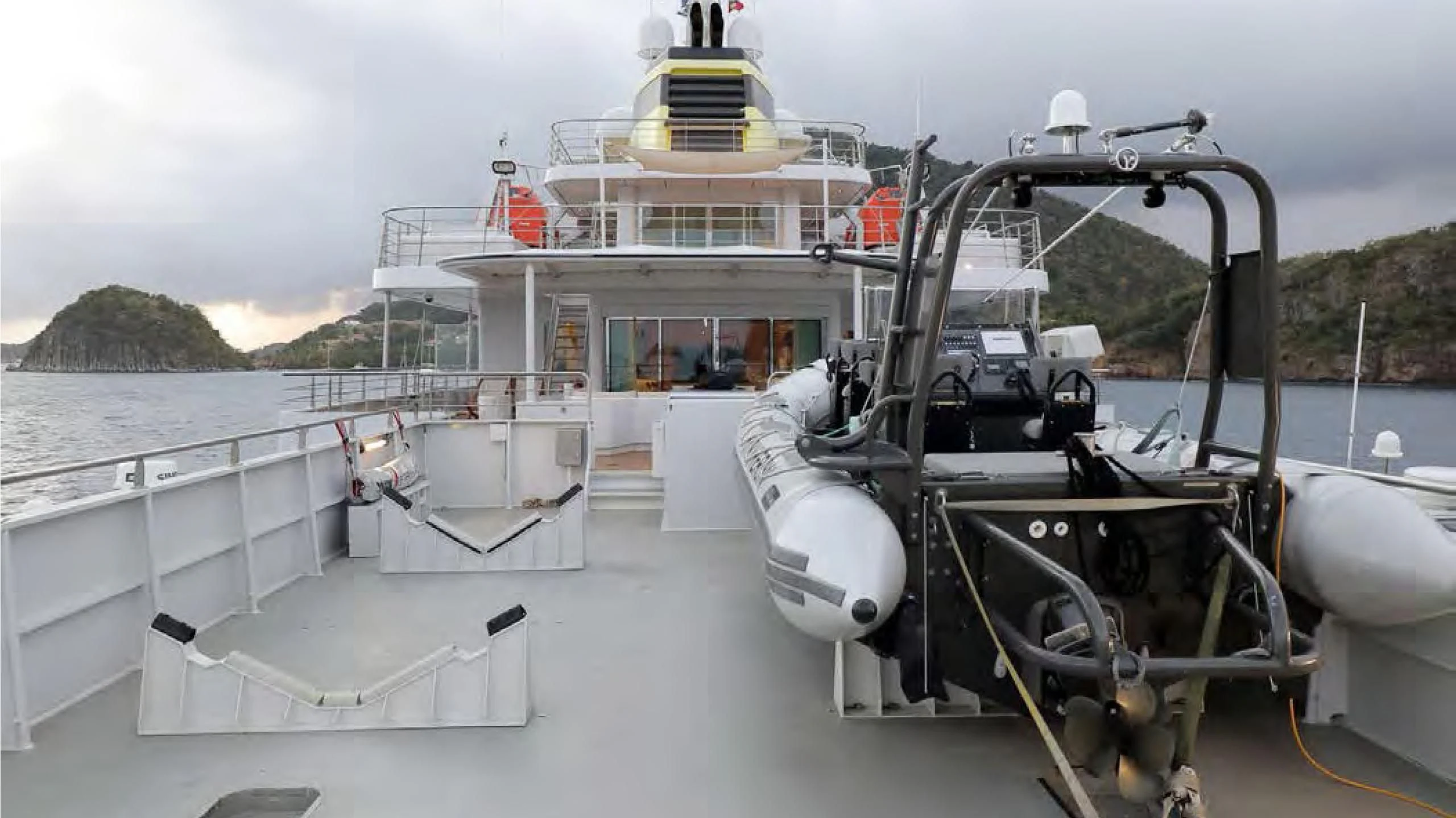 a ship docked at a port aboard YERSIN Yacht for Charter