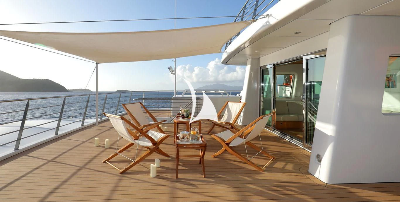 a room with a table and chairs aboard YERSIN Yacht for Charter