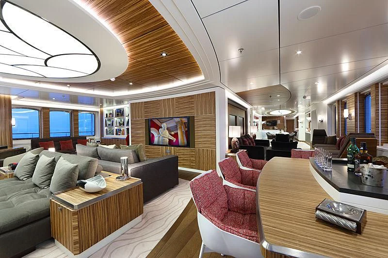 a living room with a couch and a table aboard YERSIN Yacht for Charter