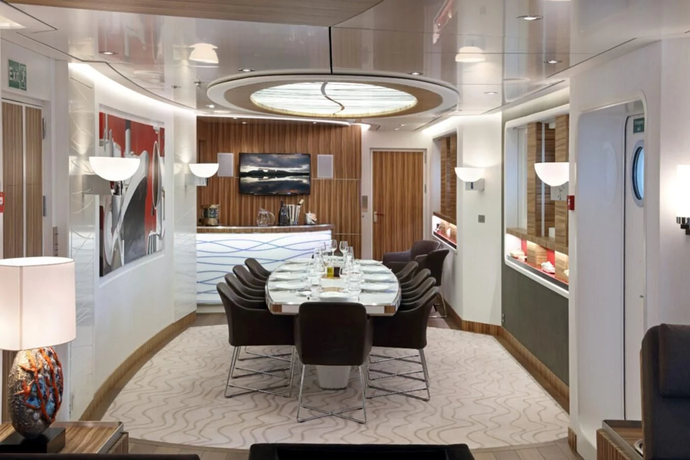 a dining room with a table and chairs aboard YERSIN Yacht for Charter