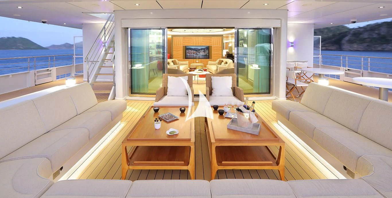 a living room with a table and chairs aboard YERSIN Yacht for Charter