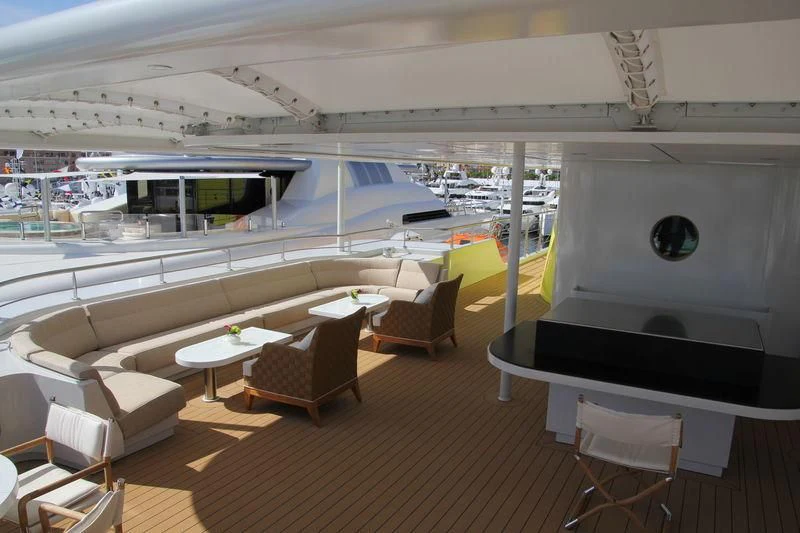 a room with a couch and chairs aboard YERSIN Yacht for Charter