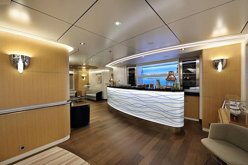 a room with a pool table and a large screen aboard YERSIN Yacht for Charter
