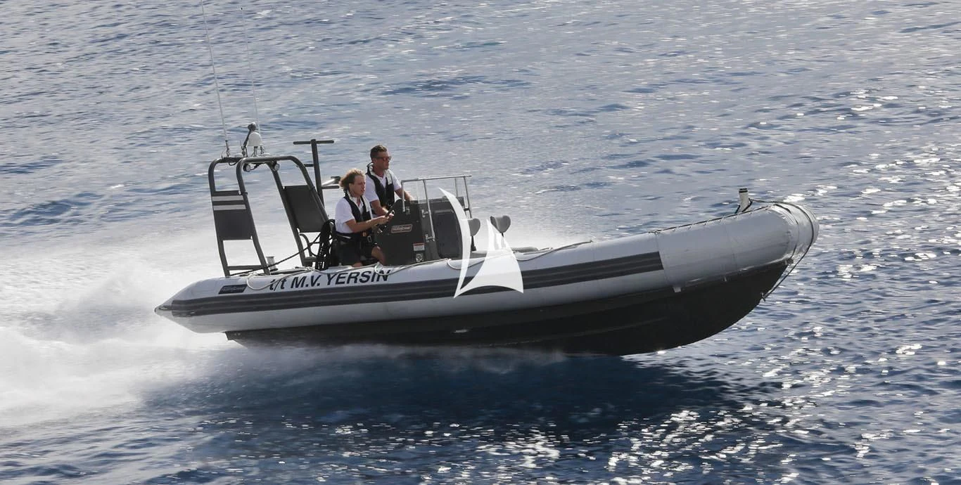 a man and woman in a boat aboard YERSIN Yacht for Charter
