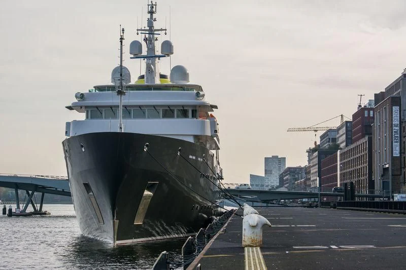 a large ship docked aboard YERSIN Yacht for Charter